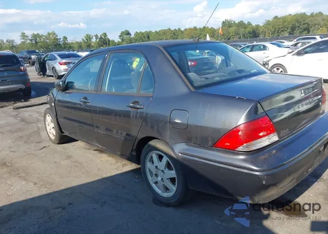 2002 Mitsubishi Lancer Ls from USA, damaged, VIN JA3AJ36E62U053415